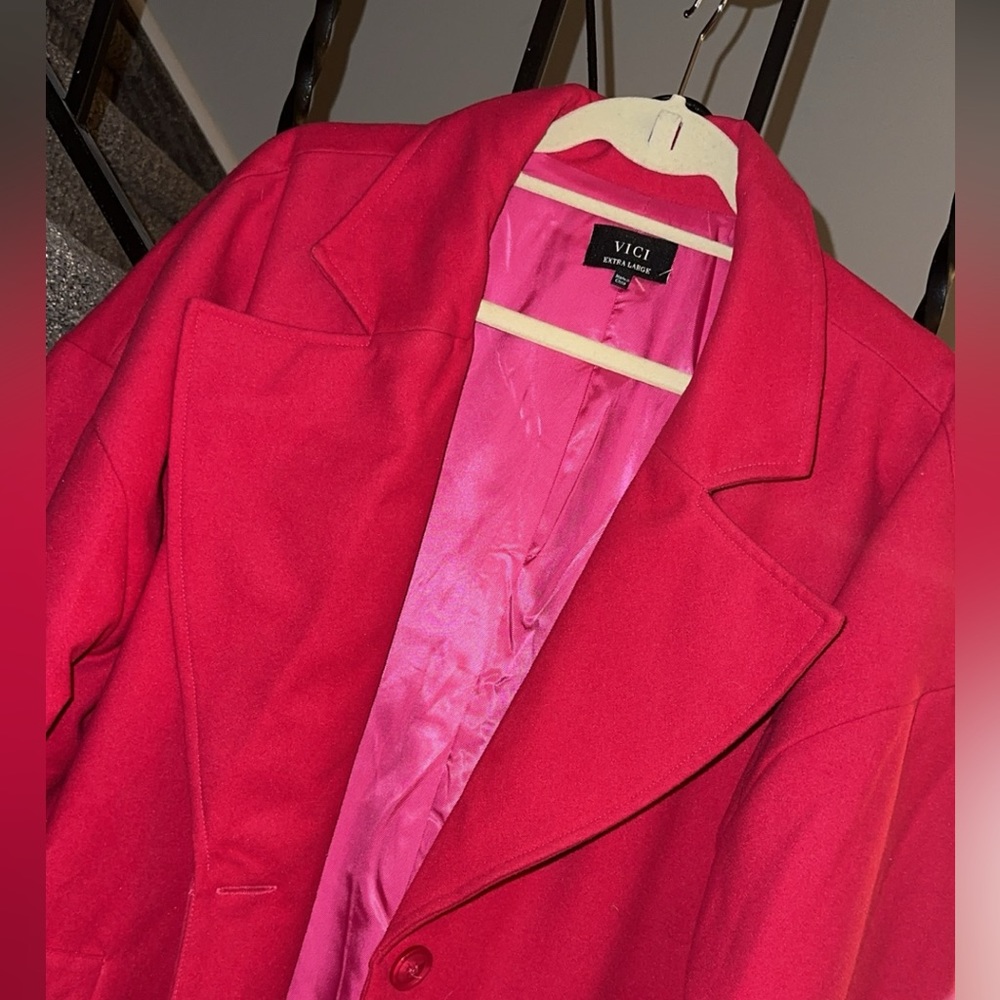 Vici. Long pink coat.